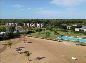 an aerial view of a resort with a swimming pool at Cozy Premium Delta Cabin Private Dock in Tigre