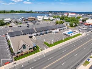 an aerial view of a parking lot next to a road at Surfside Motel in Point Pleasant Beach