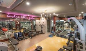 a gym with treadmills and machines in a room at 대구 2월 호텔 동성로점 in Daegu