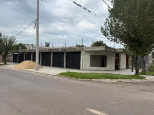 an old building on the side of a street at Josefina l in Goya