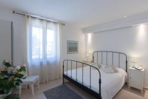 Ένα ή περισσότερα κρεβάτια σε δωμάτιο στο Albergo Al Castello +41 φωτογραφίες