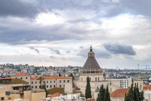 a view of a building with a dome at El Khan Guesthouse & Art - A Complex of 4 Middle Eastern-Style Suites in Nazareth