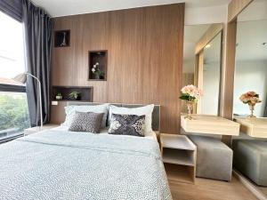 a bedroom with a large bed and a mirror at Sanphawut IDEO CONDO in Bang Chak +56 photos