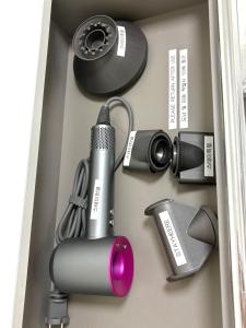 a box with a microphone and other kitchen appliances at Herry Stay in Seoul