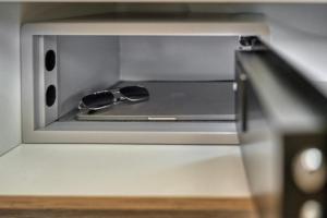 a pair of glasses sitting inside of an oven at Olive Luxury Suites - ADULTS ONLY in Kamilari