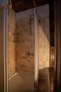 a bathroom with a shower with a bath tub at Beliz Hanım Konakları in Gaziantep +24 photos