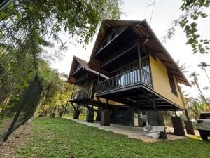 a building with balconies on the side of it at Casa Kabani Resort in Chegāt