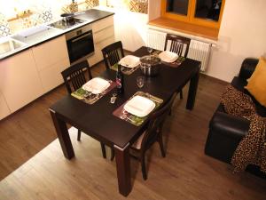 Kuchyň nebo kuchyňský kout v ubytování Apartmány na hájovně + 22 fotografií