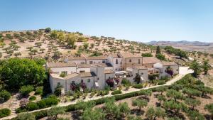an aerial view of a house on a hill at Firriato Hospitality - Baglio Sorìa in Trapani