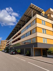 a building with a car parked in front of it at LVG Hotel Collection - La Bussola in Novara +34 photos