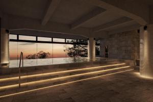 a lobby with a large window with a view at TAOYA Atami in Atami
