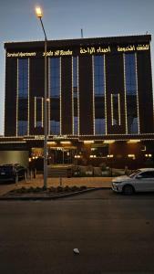 a building with a car parked in front of it at اصداء الراحة للشقق المخدومة 3 in Riyadh