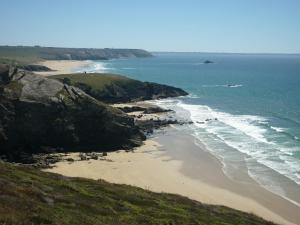 an aerial view of a beach next to the ocean at Les chambres de Kerael in Crozon