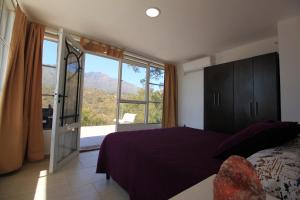 Una cama o camas en una habitación de Espacio Zen Deros 37 fotos más