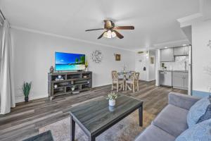 a living room with a couch and a table at Napili Ridge K6 in Napili-Honokowai