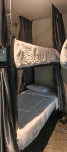 a couple of bunk beds in a room at Hana hostel in Labuan Bajo +53 photos