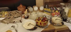 a bathroom counter with a sink with bowls of food at Hotel Kaiserpfalz in Fritzlar