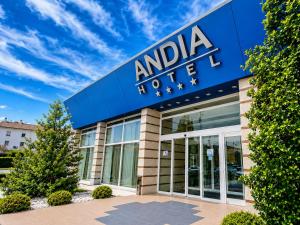 a sign for ananda hotel in front of a building at Hotel Andia in Orcoyen