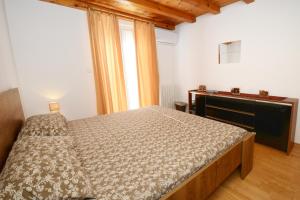 Postel nebo postele na pokoji v ubytování Sonja Vacation House