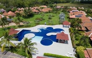 an aerial view of a resort with a swimming pool at Garden Villa in Bali Residence Mae Phim with Kids Bunk Suite in Ban Bua Phut +30 photos