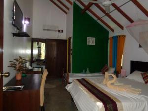 Ліжко або ліжка в номері Rimaka Village Tourist Board Approved