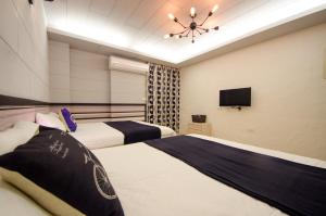 Postel nebo postele na pokoji v ubytování Successful 168 B&B