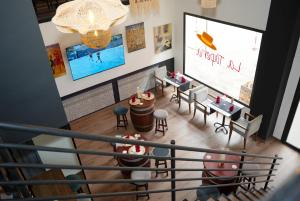an overhead view of a restaurant with tables and chairs at Blue Sea Le Printemps in Marrakesh +58 photos