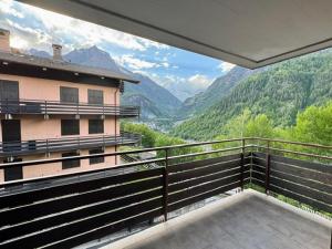a balcony of a building with a view of a valley at Casa Vacanza Caspoggio in Caspoggio