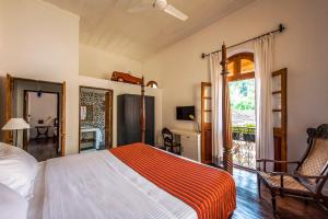 Postel nebo postele na pokoji v ubytování Mateus Boutique Hotel