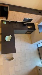 an overhead view of a kitchen with an apple logo on a counter at La Torre di LuSi in Castellammare di Stabia +85 photos