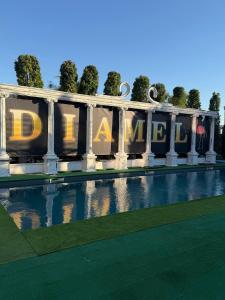 a building with the words diana on the side of it at DiAmel in Petropavlovskaya Borshchagovka