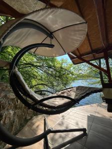 a view from the inside of a table with an umbrella at Zmajeva Kuca in Mali Zvornik