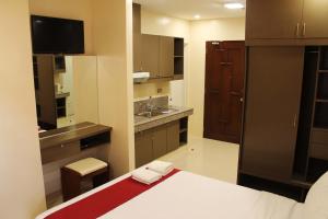A cozinha ou kitchenette de Sebastien Hotel