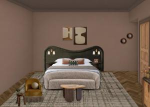 a bedroom with a large bed and a chair at Villa Nord in Trondheim