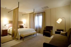 Posteľ alebo postele v izbe v ubytovaní Hotel La Vida Spa