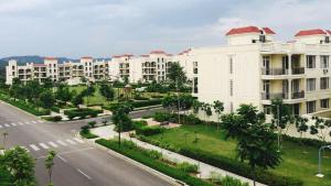 an empty street in front of a large building at Entire 4bhk villa in Panchkula, Chandigarh in Panchkula