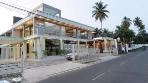 a building on the side of a street at A One Resort in Negombo