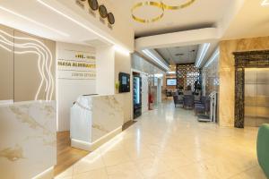 a view of the lobby of a mac cosmetics store at THE Hotel MASA Almirante LISBON Stylish in Lisbon