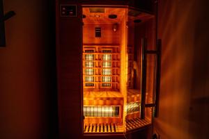 an open door of a building with lights on at Wyspa Wisła Przyjazna Przystań Stężyca in Stężyca