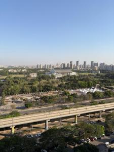an overhead view of a city with a freeway at The Kaksh in Greater Noida