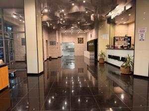 a hallway of a building with a tile floor at Spa Hotel Ata in Varshets +91 photos