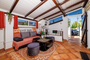 a living room with a couch and a table at Bobbys Home in Selce