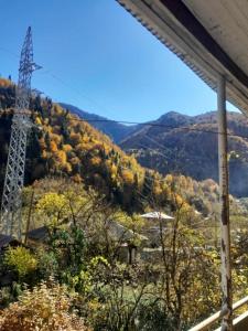 a view of the mountains from a house at Hotel Dede in Lentekhi