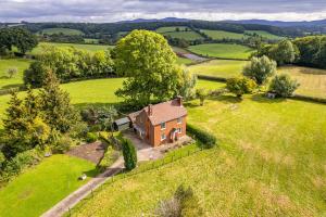an aerial view of a house in a field at Foxhill House in Ledbury