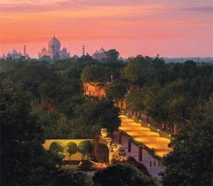 a view of a street with a city in the background at Hotel Taj Plaza, Just a 5-minute walk from the Taj Mahal 600 meters in Agra