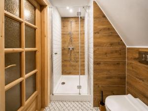 a bathroom with a shower and a toilet at Góralski Dwór in Kościelisko +55 photos