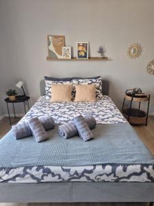 a bed with three pillows on it in a bedroom at Cozy Studio Sea View in Chayofa in Chayofa