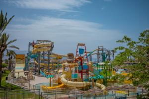 a large water park with a water slide at U Splash Resort Eilat in Eilat