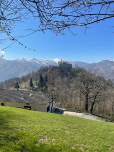 a view of a castle on top of a hill at Nùi Homestay in Monastero di Lanzo