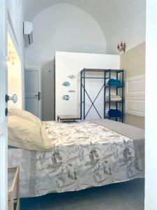a bedroom with a bed in a room at Amare Gallipoli in Gallipoli